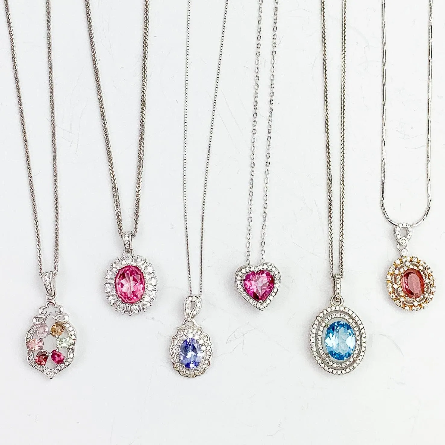 Diamonds & Gems in Silver Pendants