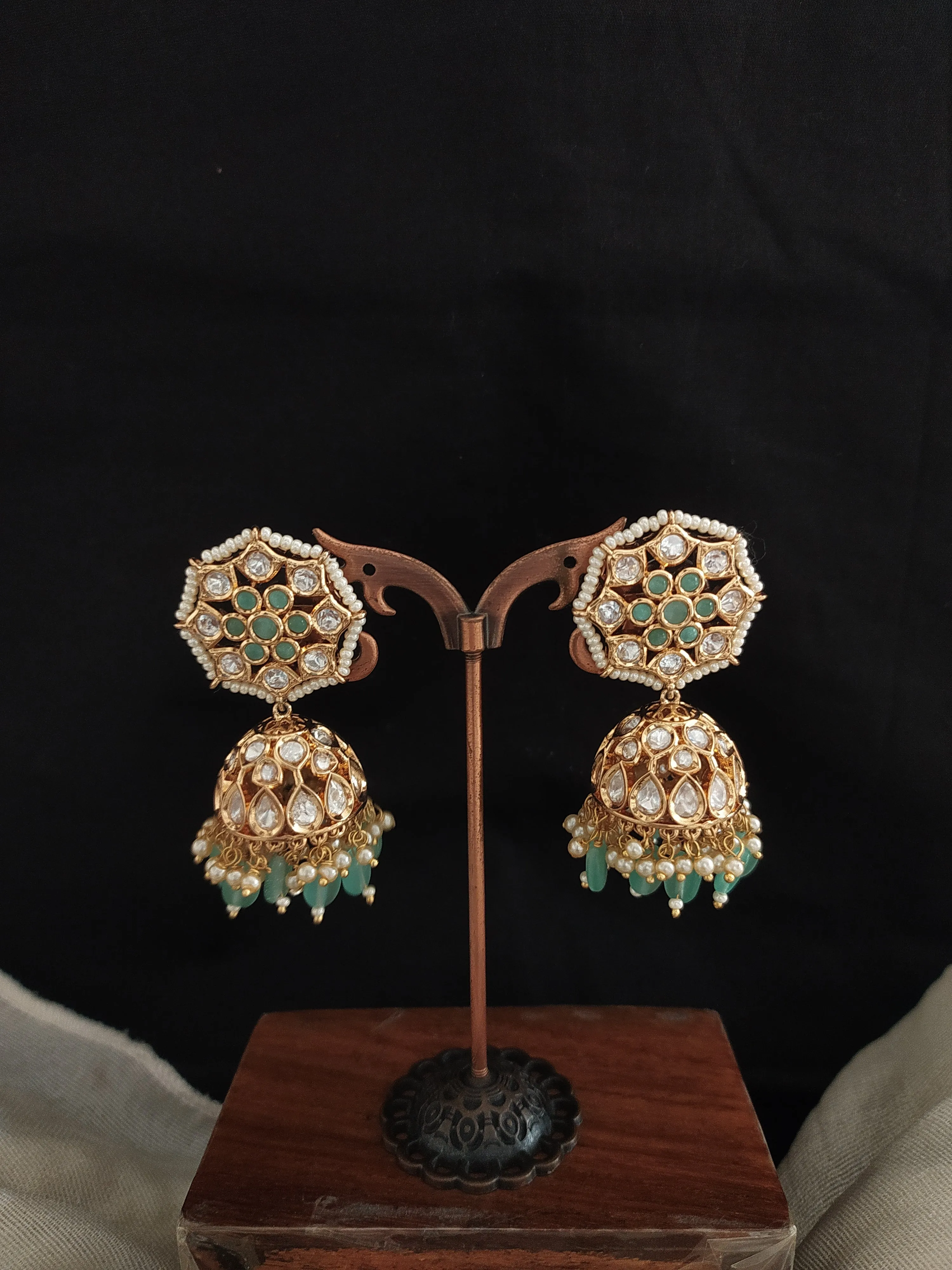 Exquisite Floral Design Kundan Jhumki in Pastel Mint and White with Bead Drops