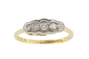 Five stone diamond ring in 18 carat gold and platinum