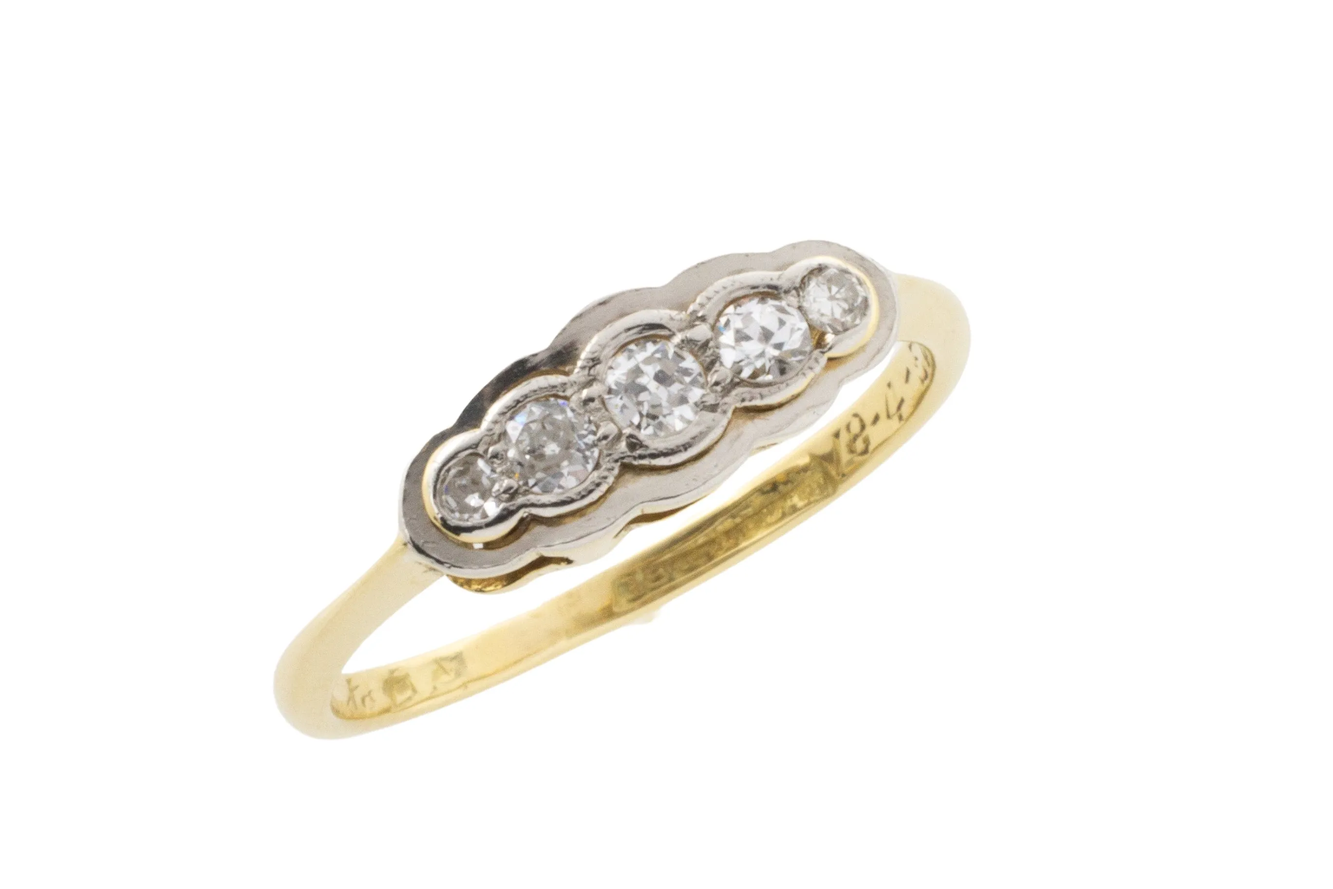 Five stone diamond ring in 18 carat gold and platinum