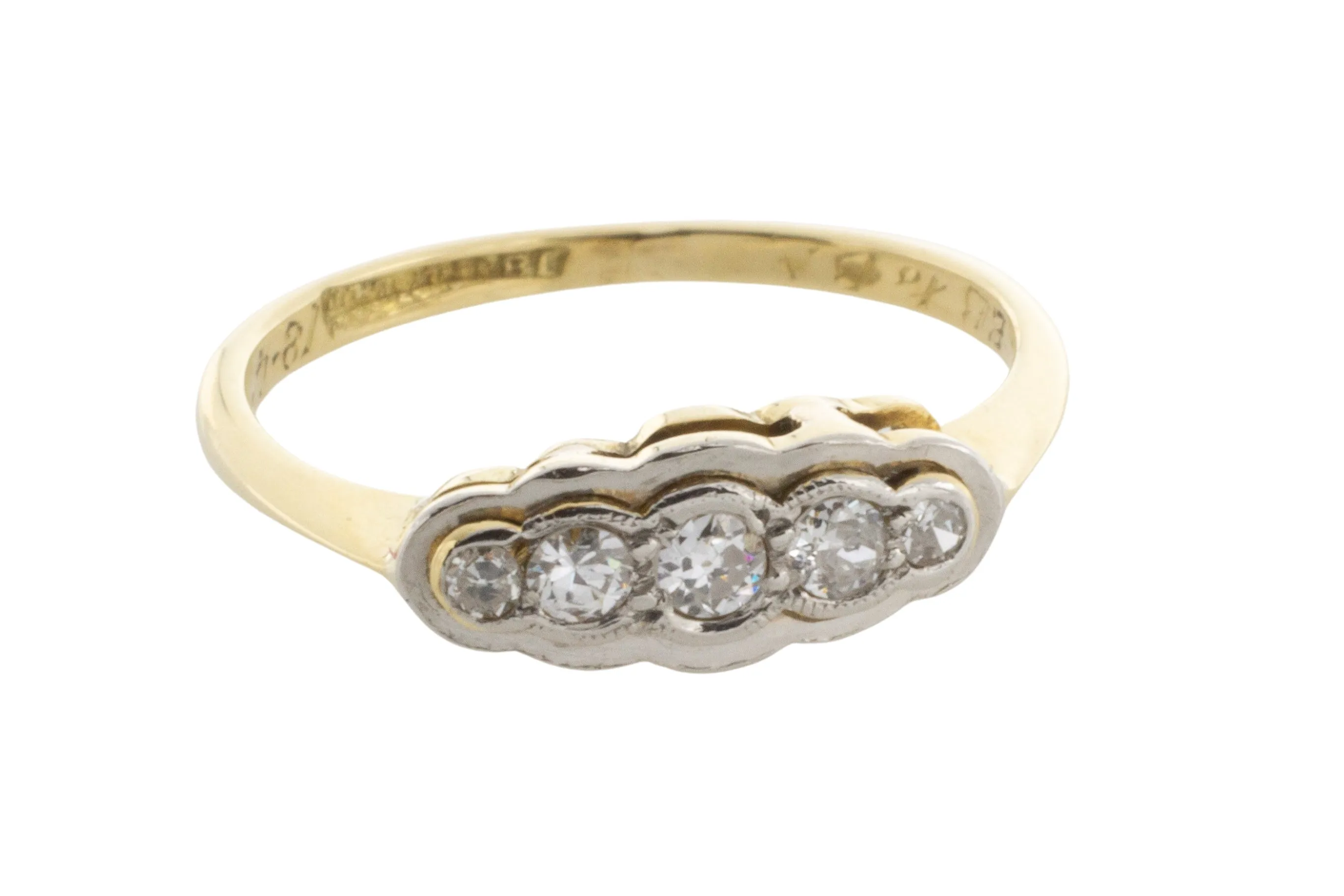 Five stone diamond ring in 18 carat gold and platinum