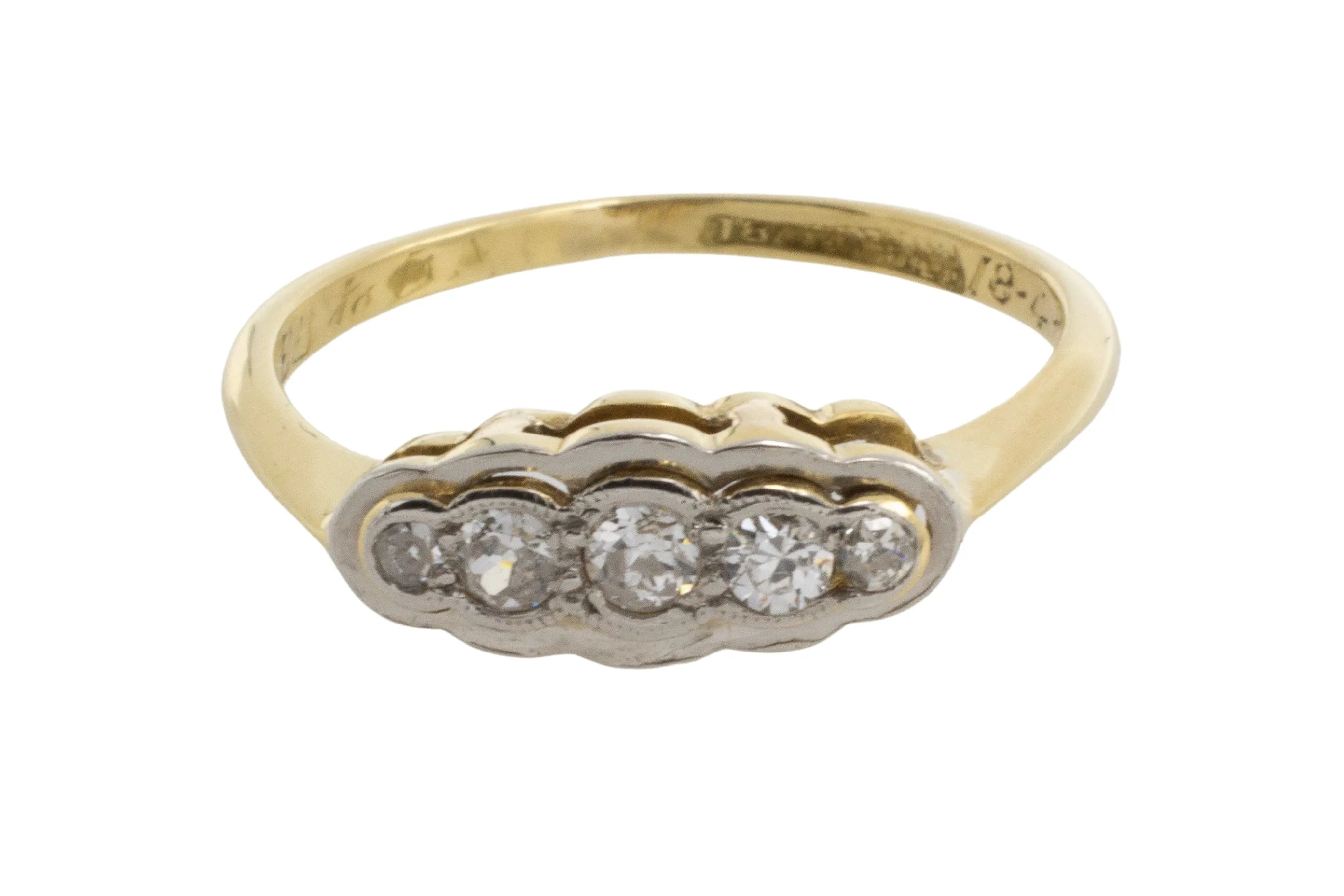 Five stone diamond ring in 18 carat gold and platinum