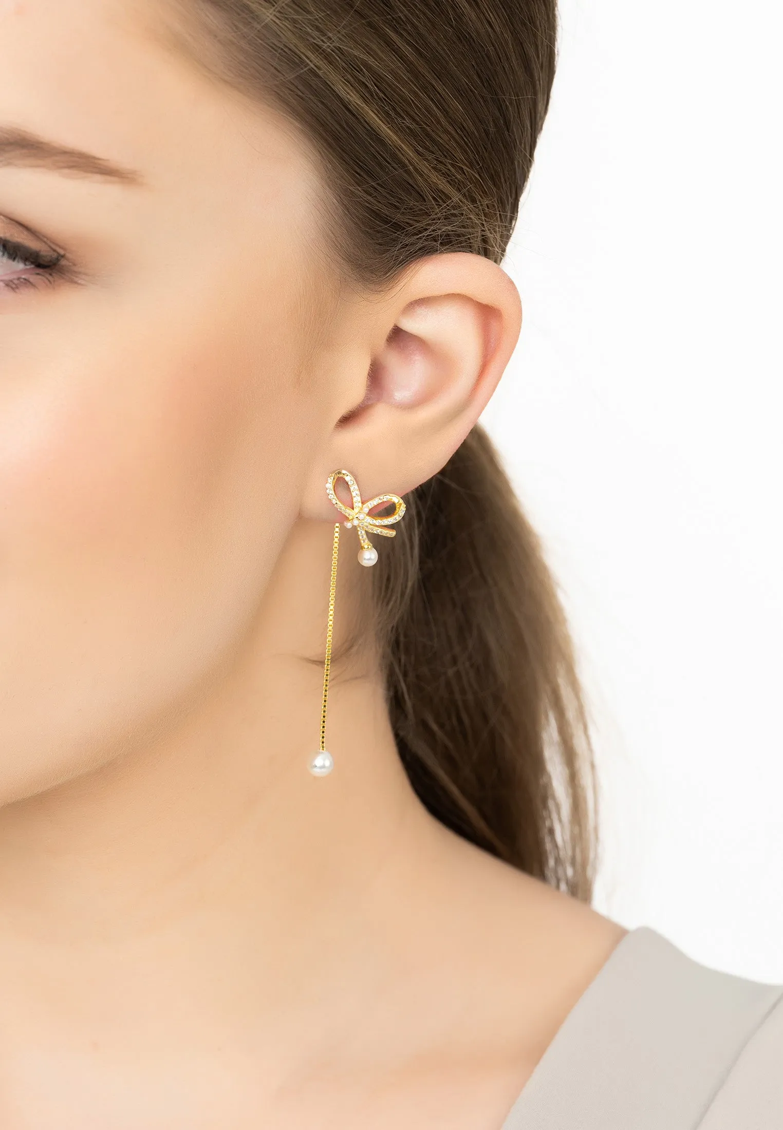 Flowing Ribbon Pearl Drop Earrings Gold