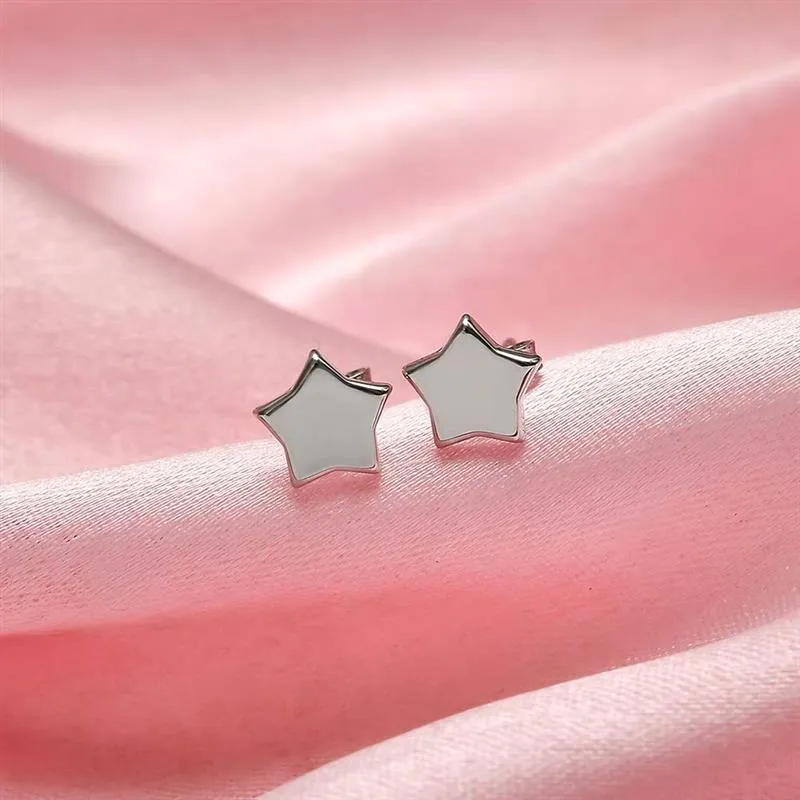 Gold Star Stud Earrings in 9K White Gold