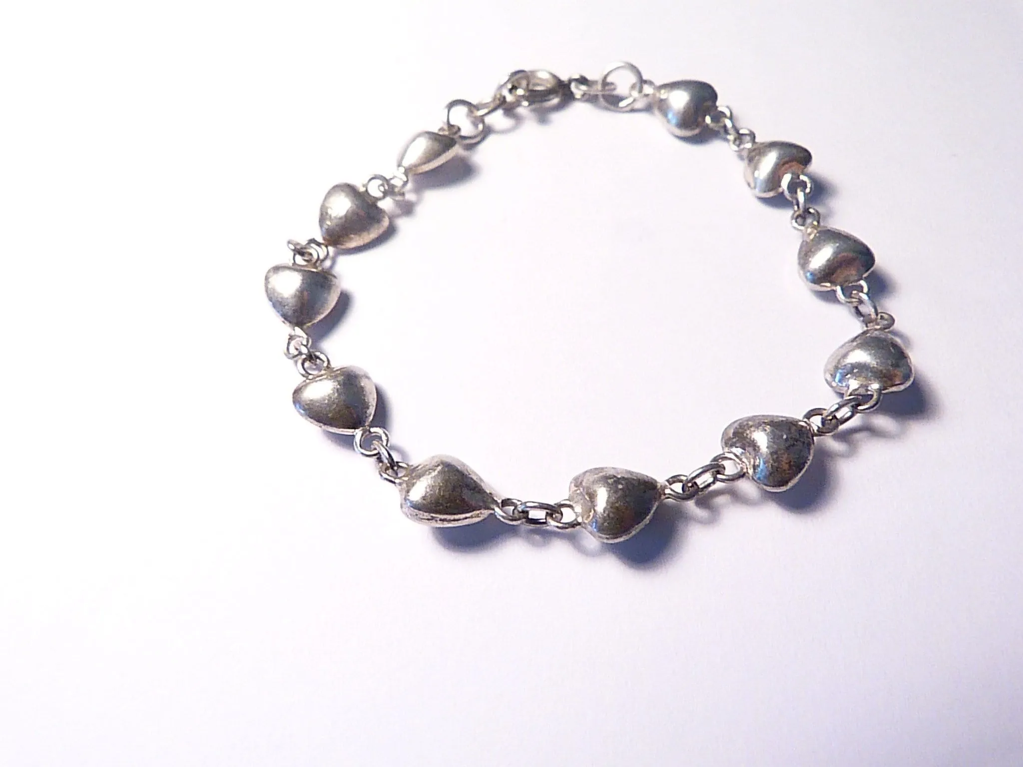 Hallmarked silver wedding bracelet 1950s hearts charm bracelet