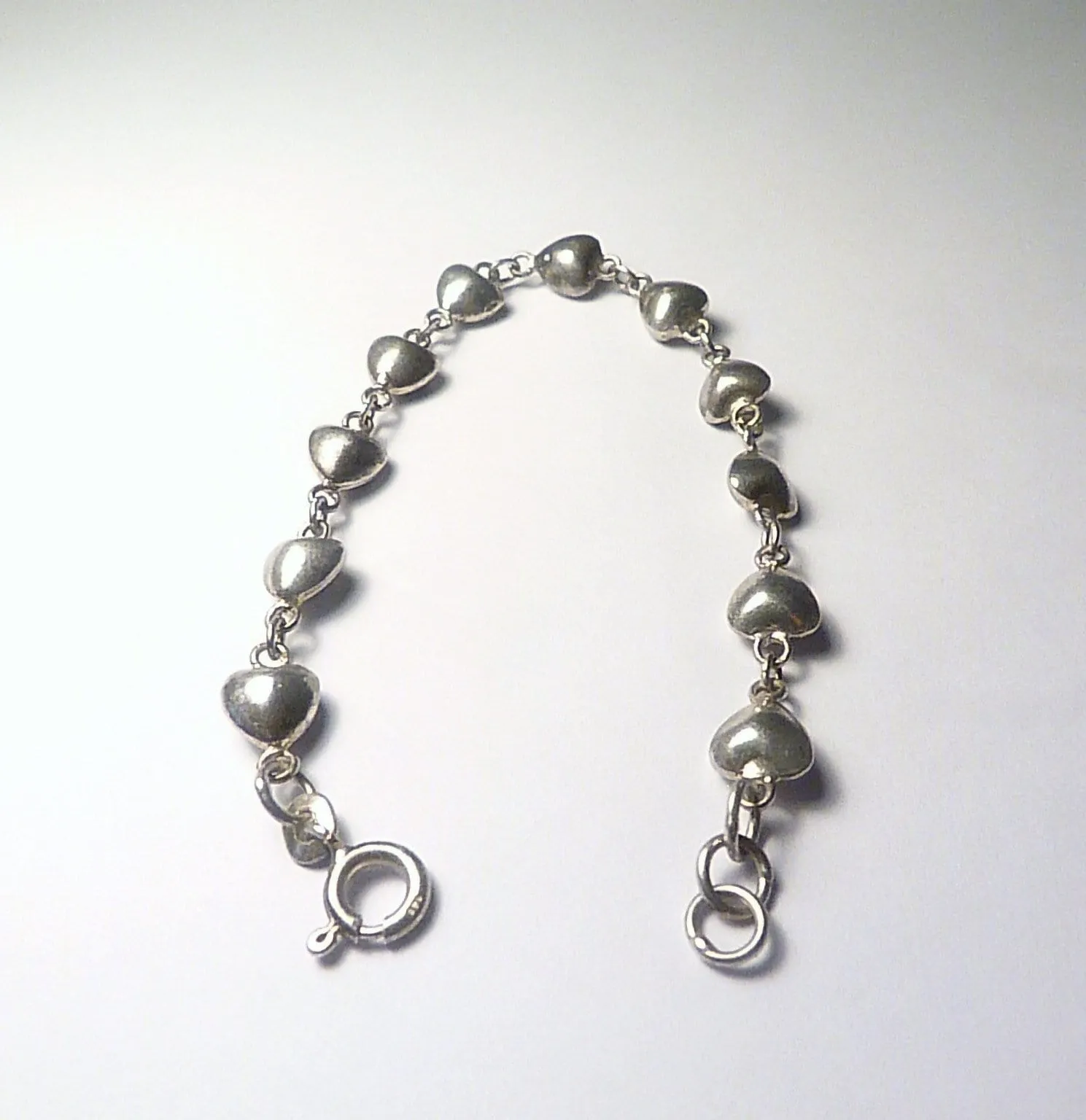 Hallmarked silver wedding bracelet 1950s hearts charm bracelet