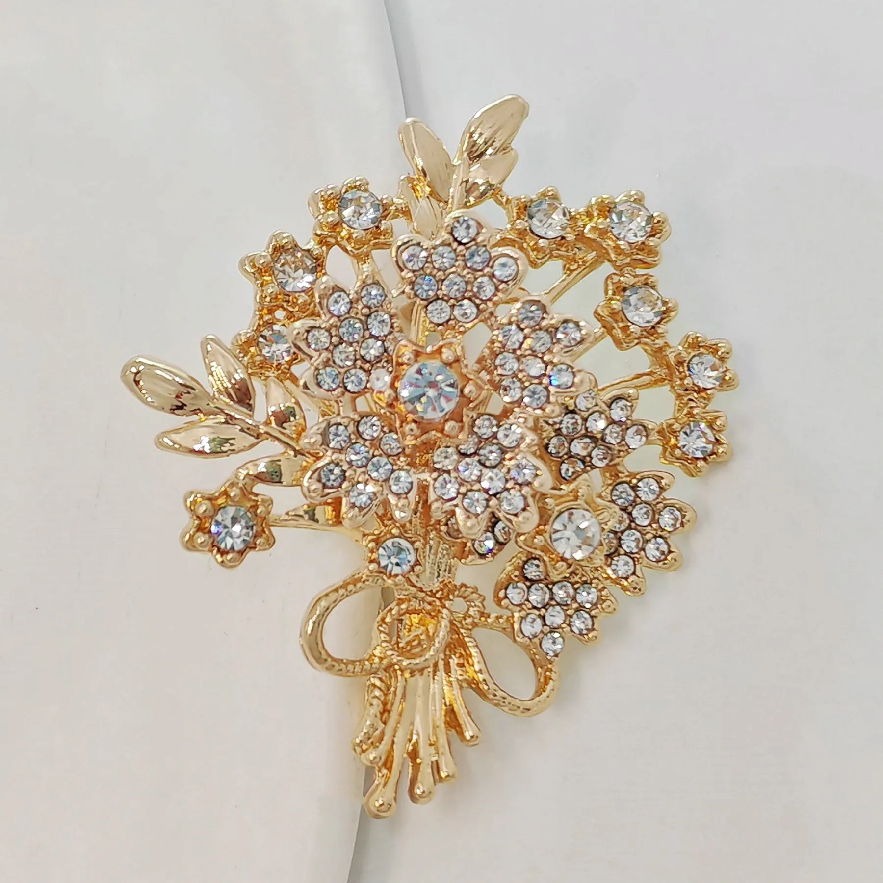 Sparkles Vintage Gold-tone Stem Leaf Crystal Flower Bouquet Brooch with Bowtie Accent