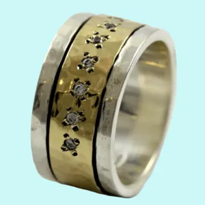 Spinner ring for woman. Set cz zircons.